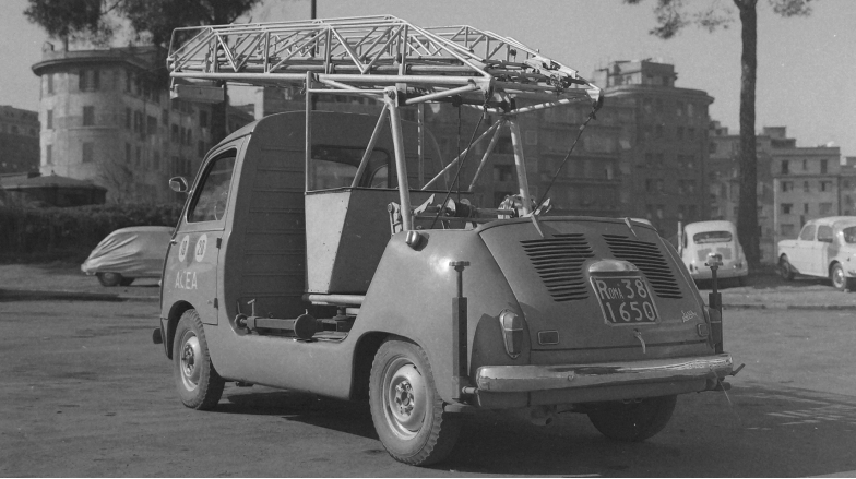 Vintage black and white photo of an old Fiat 600 multiple car