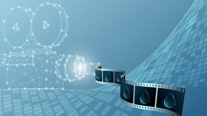 cinepresa stilizzata da cui esce un negativo in cui si vedono le gocce
