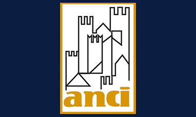 Logo assemblea anci composto da un castello stilizzato e la scritta anci